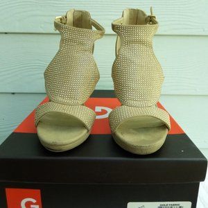 Size 6M G By Guess Glamo peep toe heel. Gold fabric. Platform heels